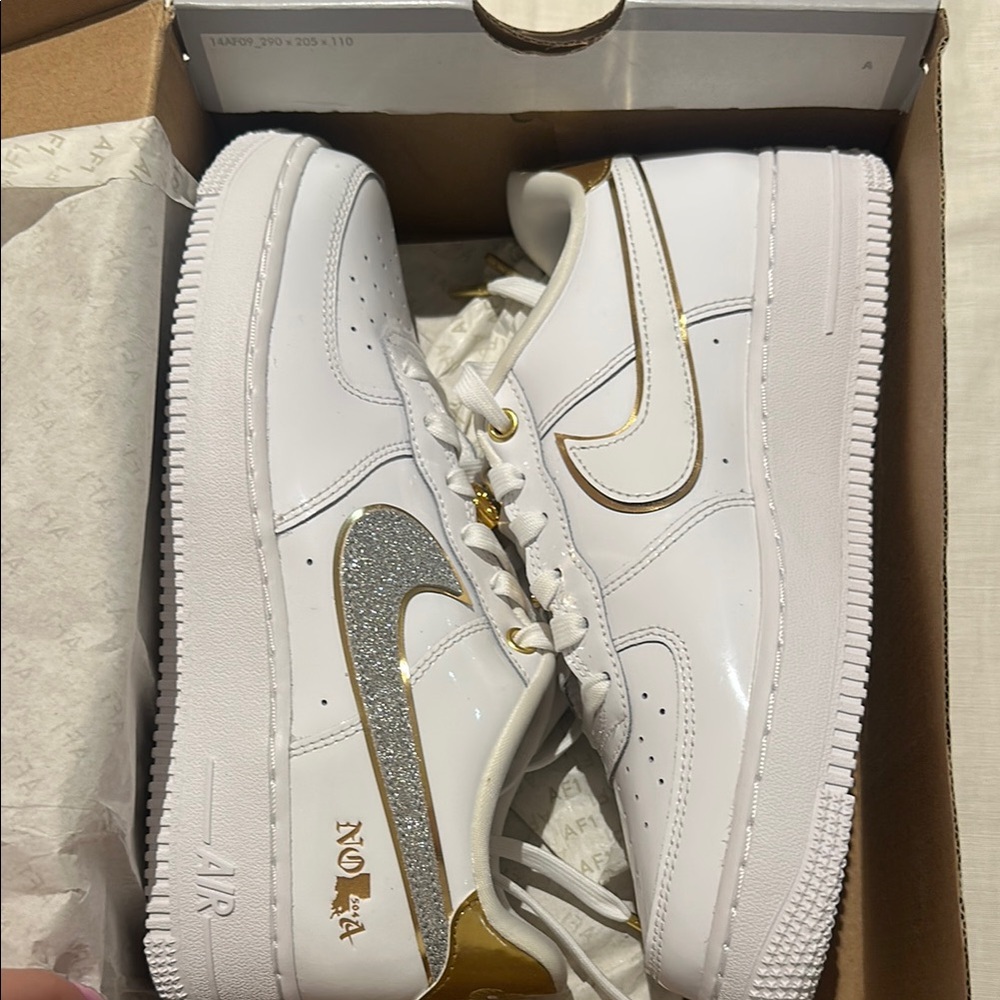 Nike Women’s White Sneakers with Gold and Silver Accents